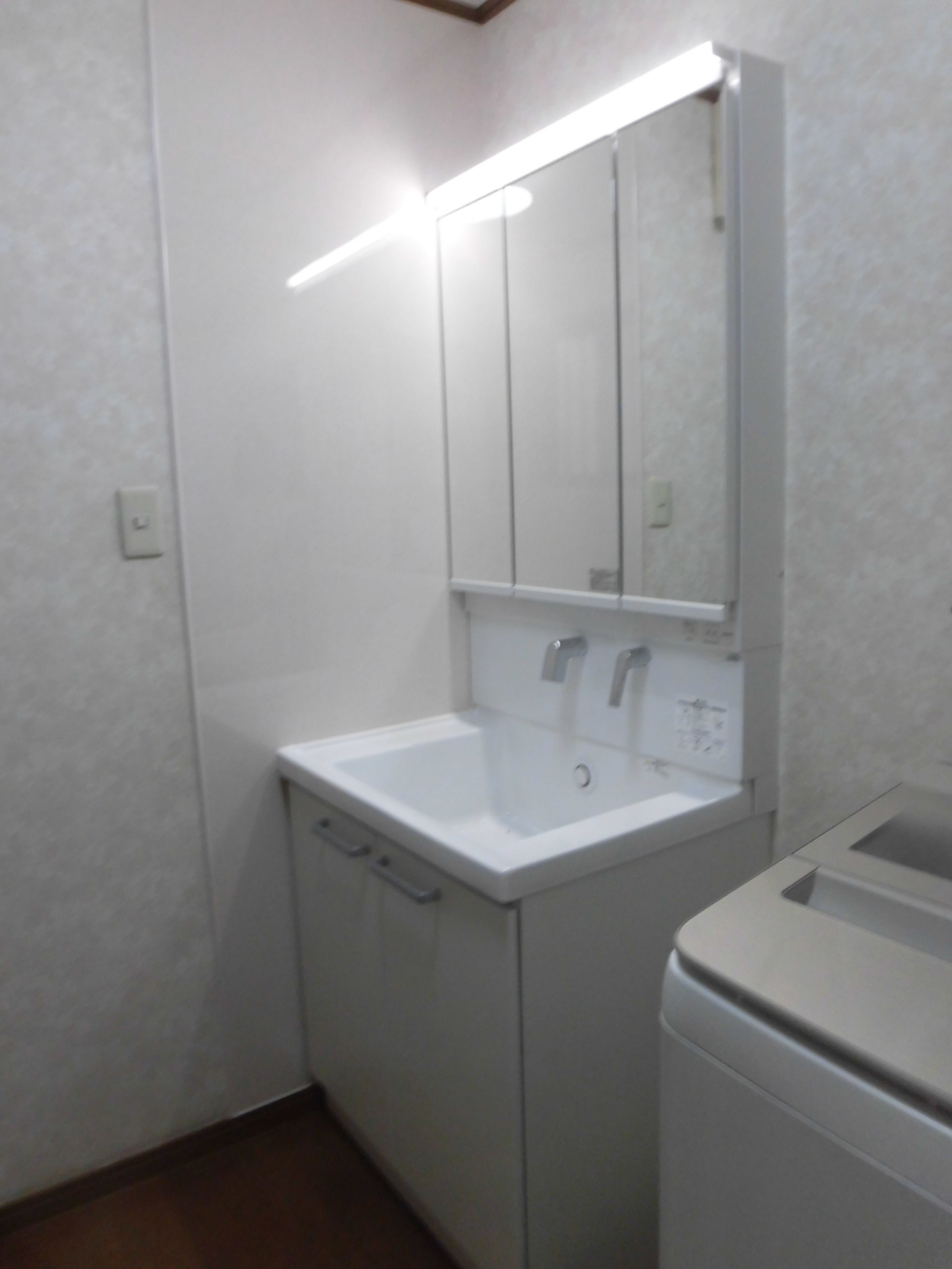 リフォーム工房よしだの洗面所の施工事例の施工後完成です